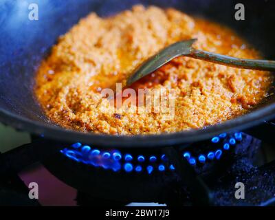 Chef Stir Fry Seasoning In Wok Stock Photo