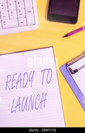 Conceptual hand writing showing Ready To Launch. Concept meaning an event to celebrate or introduce something new to market Crumpled white paper on ta Stock Photo