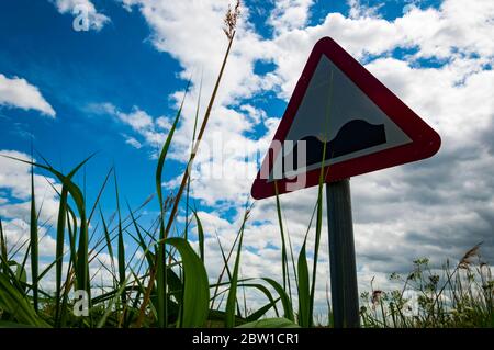 bumpy road ahead sign bumpy road ahead sign