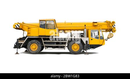 Yellow mobile crane truck isolated on white background Stock Photo - Alamy
