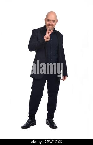 man making the victory sign on a white background Stock Photo