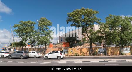 nearly empty street at the entrance of Jerusalem in israel during the corona covid pandemic showing the central bus station area under reconstruction Stock Photo