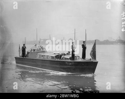 King George VI [Former Duke of York] and Queen Consort [Former Duchess of York, former Lady Elizabeth Bowes-Lyon] aboard the Royal Barge at Greenwich. 25 April 1937 [?] Stock Photo