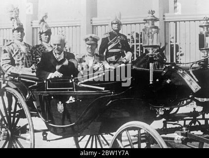 Polish President drives with King Carol through Bucharest. President Moscicki of Poland and King Carol of Romania drove together in an open carriage through the streets of Bucharest to the Royal Palace after the arrival of the Polish President for political talks. It is understood that the visit of the President and his Foreign Minister, Col Beck, is in connection with Poland's desire to form a barrier of neutral states between Russia and Germany. Photo shows, President Moscicki (left) and King Carol as they drove together through Bucharest 10. June 1937 Stock Photo