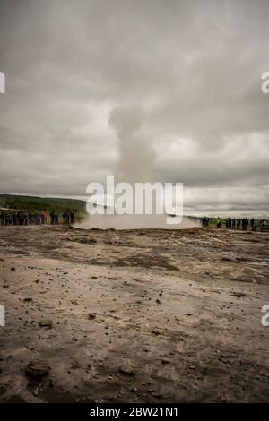 Geyser eruption in Iceland while blowing water Stock Photo - Alamy