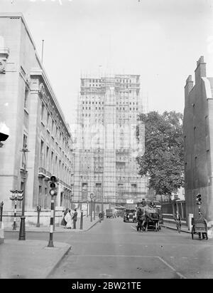 A view of the 210 ft of the tower of the new University of London building which is now nearing completion in Bloomsbury. With 20 story the skyscraper has the most floors any other building in London and is constructed of brick on concrete piles. [Scaffolding] 30 August 1937 Stock Photo