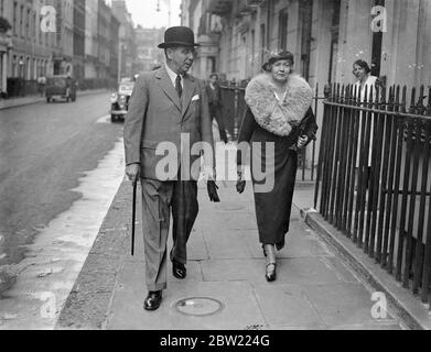 Sir Geoffrey Northcote with his wife for the Colonial office. The newly appointed governor of Hong Kong, went to the Colonial office in London before leaving England by air to take up his post. The governorship of Hong Kong carries a salary of Â£7000 including 2200 entertainment allowance. The new governor will find himself with two residents one government house has been ravaged by white and but is being made habitable the other is mountain lodge. 29 September 1937. Stock Photo