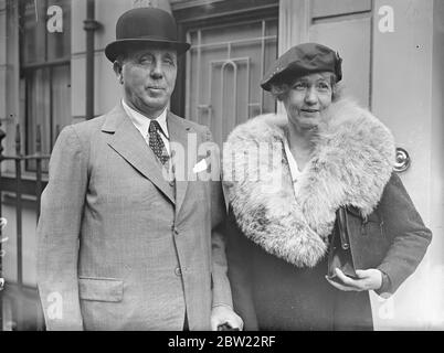 Sir Geoffrey Northcote with his wife for the Colonial office. The newly appointed governor of Hong Kong, went to the Colonial office in London before leaving England by air to take up his post. The governorship of Hong Kong carries a salary of Â£7000 including 2200 entertainment allowance. The new governor will find himself with two residents one government house has been ravaged by white and but is being made habitable the other is mountain lodge. 29 September 1937. Stock Photo