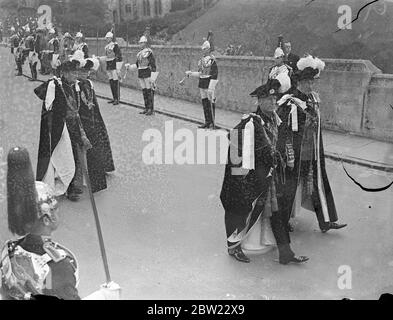 The Marquess of Londonderry (left) and the Earl of Harwood, in the procession, wearing robes during the order of the Garter ceremony at Windsor. 14 June 1937 ?] Stock Photo