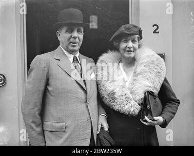 Sir Geoffrey Northcote with his wife for the Colonial office. The newly appointed governor of Hong Kong, went to the Colonial office in London before leaving England by air to take up his post. The governorship of Hong Kong carries a salary of Â£7000 including 2200 entertainment allowance. The new governor will find himself with two residents one government house has been ravaged by white and but is being made habitable the other is mountain lodge. 29 September 1937. Stock Photo