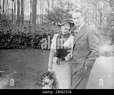 Ex-Kaiser's grandson and bride leave on honeymoon. World tour gift from grandfather. Prince Louis Ferdinand, second son of the ex-Crown Prince and grandson of the ex-Kaiser, left, Doorn House, Holland, with his bride, the former Grand Duchess,Kyra of Russia, for the honeymoon. The couple were married at Doorn House, residence of the ex-Kaiser and are now to make a world tour as the wedding gift of the ex-Kaiser. Photo shows, Prince Louis Ferdinand and his bride with Prince August Wilhelm, their uncle, as they left Doorn House for their honeymoon. 5 May 1938 Stock Photo