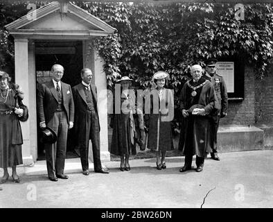 Mr Joseph P Kennedy, the American Ambassador, unveiled in Winchester Cathedral a stained glass window that has been given to the Cathedral by Americans as a tribute to the life and character of King George V. One of the lights contains a representation of the kneeling figure of the King wearing the robes of the 'Order of the Garter'. The window is the work of Mr Hugh Easton. Photo shows, Mr Joseph P Kennedy (left) with lord Mottistone, Lord Lieutenant of Hampshire, and Mrs Kennedy (right) with the Mayor of Winchester, Mr W P Richardson, outside the Mayor's Parlour after lunch.. 12 July 1938 Stock Photo