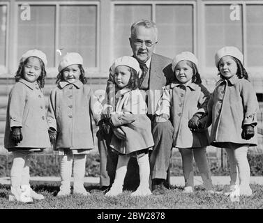 Dr Dafoe and the Dionne quintuplets Stock Photo - Alamy