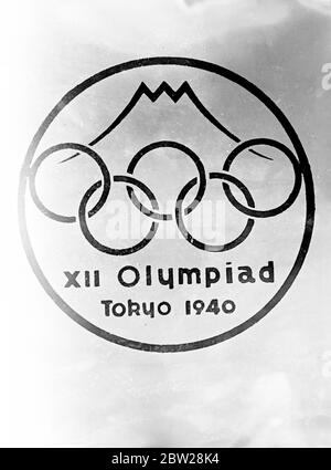 Tokyo prepares for Olympic games despite war. Prize-winning design. Despite her preoccupation with the hostilities in China. Japan is pushing ahead with preparations for the 1940 Olympic Games, which are to be take place in Tokyo. The design for the Tokyo Olympic badge has been selected and all kinds of propaganda material being produced. Photo shows, the prize-winning design for the Tokyo Olympic Games badge. 17 December 1937 Stock Photo