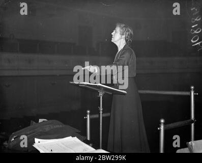 First woman conductor in Royal Philharmonic Society history. Rehearsal where Queens Hall. The first woman to conduct the Royal Philharmonic Society's Orchestra in its hundred and 26 years history, Nadia Boulanger, rehearsed with the orchestra at the Queens Hall for the concert to be given tomorrow (Thursday). Mlle Boulanger is to conduct the Boston Symphony Orchestra this winter. 3 November 1937 Stock Photo