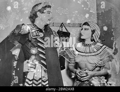 Tallulah and husband, co-players in 'Antony and Cleopatra'. Tallulah Bankhead and John Emery, Jr, who were married. only last month, photographed when they appeared together in the play 'Antony and Cleopatra' in Rochester, New York. Tallulah plays Cleopatra and her husband Caesar. Conway Tearle plays opposite Miss Bankhead as Marc Antony. 20 October 1937 Stock Photo