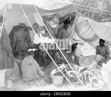 Abyssinian / Ethiopian crisis - Dessie / Dese / Dessye was first bombed 6 December 1935, during the Italian invasion of Abyssinia. The American Hospital was one of the buildings damaged in the attack [first aid point, tent, hospital, man on a stretcher] 6 December 1935 Stock Photo