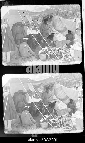 Dessie / Dese / Dessye was first bombed 6 December 1935, during the Italian invasion of Abyssinia. The American Hospital was one of the buildings damaged in the attack [first aid point, tent, hospital, man on a stretcher] 6 December 1935 abyssinian / ethiopian crisis Stock Photo