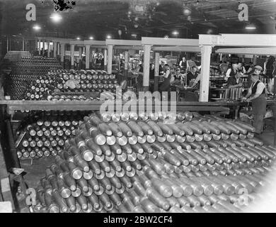 Where Britain forges victory. This pictures were taken in a Royal Ordinance factory of the Ministry of Supply where, thousands of workers are producing arms and ammunition which will help to ensure the victory of Britain and her Allies. Photo shows: a general view in the shell factory 13 November 1939 Stock Photo