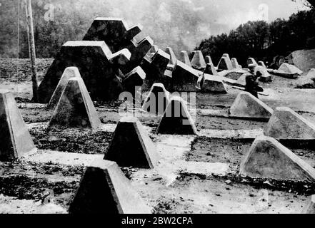 Reinforced concrete ramparts, like giant's teeth, that form tank traps on Germany's western frontier that marches with France. Traps like these spread the length of the Siegfried Line. 21 August 1939 Stock Photo