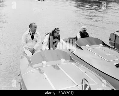 A girl of 18 beat Captain George Eyston, the world land speed record holder, when the first race meeting of modern hydroplane to take place near London was held on to Ruislip reservoir. The girl was Miss Beryl Pritchard, daughter of Mr Percy Pritchard, president of the British Hydroplane Racing Club, who gained second place in the First Ruislip Whippet race, while captain Eyston finished third. The meeting was organised by the British Hydroplane Racing Club in corporation was this group of men connected with the Royal Motor Yacht club (of which the King is Admiral). Photo shows: Miss Beryl Pri Stock Photo