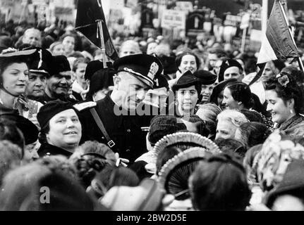 Commendatore Rena Parenti, chief of the Fascist organisation in Lombardy, Italy, surrounded by woman supporters when he attended the Annual Festival of Fascist Women at Monza, Lombardy. 26 October 1938 Stock Photo