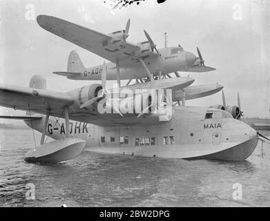 The two parts of the Mayo visit aircraft the pick a back plane and now completed at Rochester where the mercury for injured the claim has been placed on top of the Maia 3350 hp flying boat. The plane is expected to bring India and New York within days non-stop flight. 12 October 1937. Stock Photo