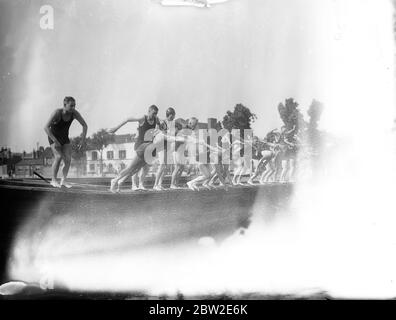 The competitors diving in at the start of the national long-distance swimming champion ship race in which C.T Dean of Penguin is trying to gain his fourth successive victory it took place over the course from Kew to Putney 24 July 1937 Stock Photo
