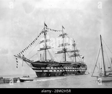 Prize Day on H.M.S. Worcester at Greenhithe, Kent. Cadets dressing the ship. Standing on masts and rigging. 31 July 1936 Stock Photo