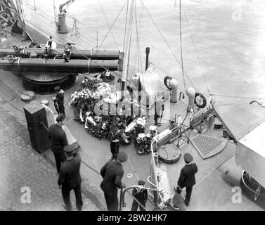 Home coming of Unknown Soldiers on H.M.S. Verdun on way home to England. Photo shows, home coming of Unknown Soldiers on H.M.S. Verdun on way home to England with the flowers covering her fore deck. 11 November 1920 Stock Photo