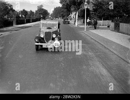 Taking part in a car rally. 193 Stock Photo