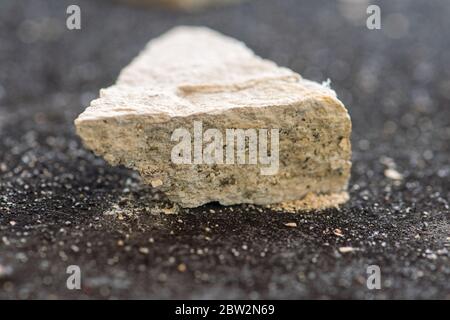 crumbling slate rock disintegrates into layers Stock Photo