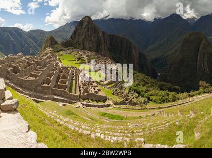 SA, Peru, Machu Picchu Ruins showing recent reconstruction Stock Photo ...