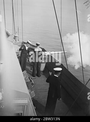 The king visits the Home Fleet . For the first time for years the King visited the Home Fleet of Weymouth . He was accompanied by the Prince of Wales and Prince George . The HMS York firing a salute as the royal yacht Victoria and Albert with the King and Princess aboard steamed down the line of anchored warships to anchor in Weymouth Bay . 12 July 1932 Stock Photo