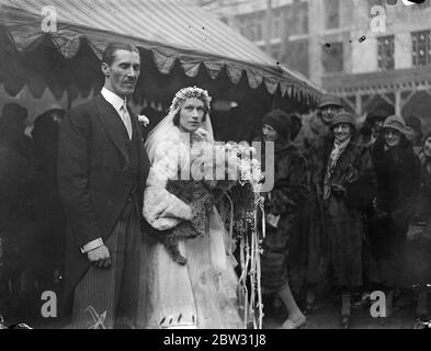 Peter Pan  weds famous Ruthven twin . The marriage of Mr Peter Llewelyn Davies , the original of Sir James Barrie 's immortal hero  Peter Pan  and a godson of the famous writer , to Miss Margaret Hore Ruthven , Governor of Jersey , and one of the famous  Ruthven Twins  of Society , took place at the Savoy Chapel , London . The bride and groom leaving the Savoy Chapel after the ceremony . 10 March 1932 Stock Photo