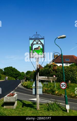 Bidborough village sign with painting of parish church and hanging ...