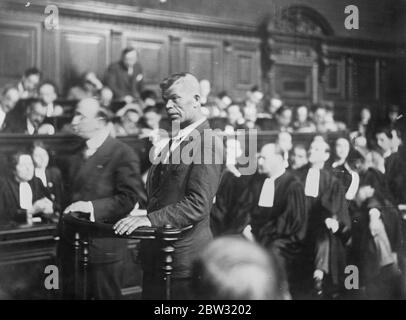 Trial of Gorguloff in Paris . Witness accuses him of torture . Remarkable scenes were witnessed in the court in Paris where Paul Gorguloff , the Russian doctor , who killed President Doumer , is on trial . He was confronted by a Cossack Ivan Lazareff , who alleged that Gorguloff , as an agent of the Cheka, had totured him with white hot needles in a Russian village . The prisoner screamed denials from the dock and later broke into a flood of weeping and vehemence . The trial was adjourned . Ivan Lazareff in the dock giving his testimony against Paul Gorgouloff . 27 July 1932 Stock Photo