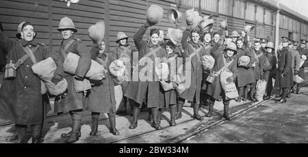 British troops leave Southampton for China . Troops from various regiments left Southampton on the troopship Neuralia from Shanghai and Hong Kong . They were drawn from the Welsh Borderers , Lancashire and Gloucestershire Regiments . Cheering troops at Southampton before embarkation at the transport for China . 12 February 1932 Stock Photo