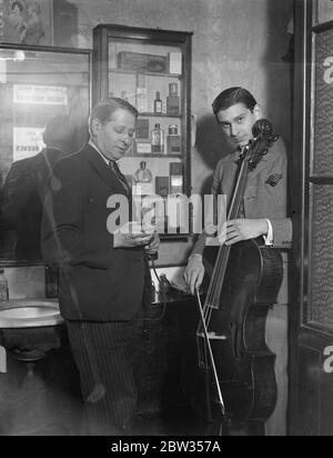 Sixteen year old boy as master of the cello . To give a big recital in London . At the age of 16 William Pleeth , son of Mr John Pleeth , a Camden Town barber , is to give a big recital at the Grotrian Hall , in London . The boy is a master of the cello and has won many medals and scholarships . At the age of 9 he won a scholarship to the London Academy of Music . At 14 he won a scholarship at the Leipzig conservatoire . The gift is perhaps inherited for his grandfather was a famous flautist in the Warsaw opera . William Pleeth playing his cello in his Cmden town , London , home . 23 February Stock Photo