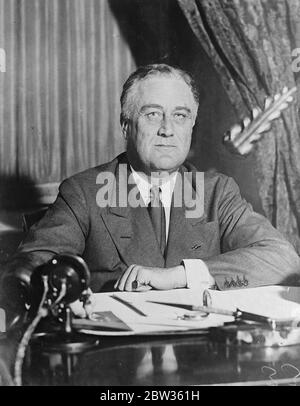 The first American President to report to the nation by wireless . President Franklin D Roosevelt of the United States has created a precedent by becoming the first American President to make regular reports to the nation by means of broadcasting . These talks now take place fortnightly and the President has chosen this method to make some of his most sensational pronouncements since taking office . Photo shows ; President Roosevelt addressing the American nation from the Oval Room of the White House in Washington . 17 May 1933 Stock Photo
