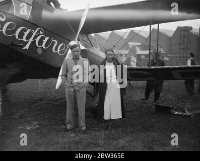 Mollisons crash a few minutes after secret dawn take off on New York flight . The machine in which Mr and Mrs James Mollison had just taken off at dawn at the start of their flight to New York , came to grief on Croydon Aerodrome just after take off . The machine suddenly lost height and crashed on the ground breaking both wings and the propellor and tearing the engine away . Both Mr and Mrs Mollison ( Amy Johnson ) are heartbroken at the delay to the start of their flight . Mr and Mrs Mollison standing despondently amid the wreckage of their machine after the crash . 8 June 1933 Stock Photo