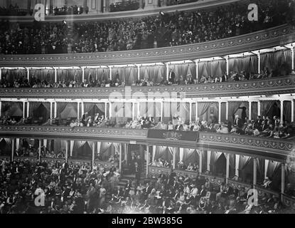 King and Queen attend Albert Hall Concert . Their majesties the King and Queen attended a Concert at the Royal Albert Hall , London , in aid of musicians Benelovent fund . Photo shows , a general view of the scene inside the Albert Hall . 11 May 1934 Stock Photo