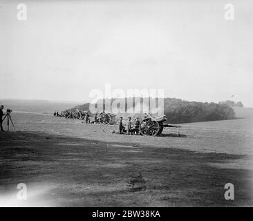 Champion batteries of the territorial field artillery of England , Scotland , and Wales are competeing for the King ' s Prize at Larkhill on Salisbury Plain . Photo shows , the terrier gunners during the competition at Lark Hill . 27 Septemeber 1934 Stock Photo