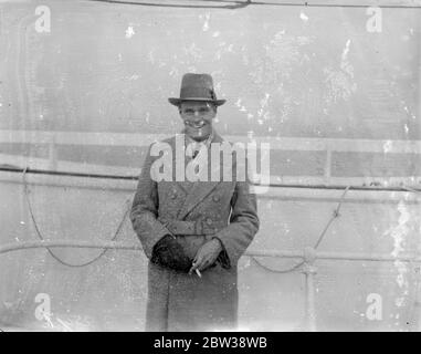 Huddersfield Town ' s South African centre forward arrives . L S Brown , the Transvaal centre forward who has been signed on by Huddersfield Town , arrived at Southampton aboard the ' Dunbar Castle ' from Cape town . Brown is 23 years of age , and is six feet two inches in height . He was welcomed on arrival by Mr Raymer , a Huddersfield director . Photo shows , L S Brown on arrival at Southampton . 30 December 1933 30s, 30's, 1930s, 1930's, thirties, nineteen thirties Stock Photo