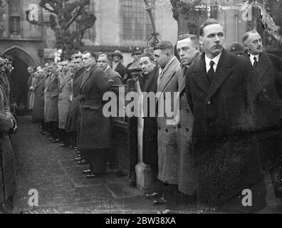 The funeral of Mr Herbert Chapman , the famous Secretary - Manager of Arsenal Football Club took place from his home in Hazelemere Avenue , London . A service was held at St Mary ' s Church , London . The Arsenal F C directors and team , Sir Frederick Mall , Secretary of the Football Association and representatives of football clubs throughout the country attended . Photo shows ; Arsenal players at the Church for the funeral service , from camera , George Male , Eddie Hapgood , James Marshall . 10 January 1934 30s, 30's, 1930s, 1930's, thirties, nineteen thirties Stock Photo