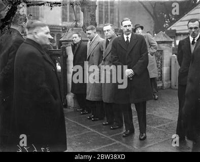 The funeral of Mr Herbert Chapman , the famous Secretary - Manager of Arsenal Football Club took place from his home in Hazelemere Avenue , London . A service was held at St Mary ' s Church , London . The Arsenal F C directors and team , Sir Frederick Mall , Secretary of the Football Association and representatives of football clubs throughout the country attended . Photo shows ; Arsenal players at the Church for the funeral service , from camera , George Male , Eddie Hapgood , James Marshall . 10 January 1934 30s, 30's, 1930s, 1930's, thirties, nineteen thirties Stock Photo