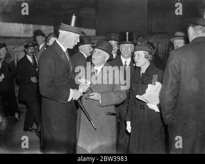 Lord Tyrrell returns home after retirement as French Ambassador . Lord Tyrrell , who has just retired from the post of British Ambassador to France in Paris , returned home and was greeted by Viscount Hampden on behalf of the King . Photo shows ; Lord Tyrrell with Viscount Hampden ( left ) on arrival at Victoria Station . 17 April 1934 . 30s, 30's, 1930s, 1930's, thirties, nineteen thirties Stock Photo