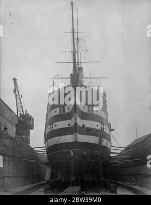 Exmouth training ship in for repairs at Blackwall . The  Exmouth  in dry dock at Blackwell Yard , where she is being overhauled . 19 July 1935 Stock Photo