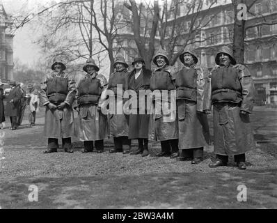 Prince of Wales presents medals for bravery at sea to Lifeboatmen in London . The Prince of Wales presented medals to a number of lifeboatmen for special bravery while assisting in saving life at sea , at the annual meeting of the Royal National lifeboat Institution in London . Photo shows left to right Captain Henry Blogg of Cromer lifeboat , Second Coxswain George Balls also of Cromer lifeboat , Coxswain Williams Fleming of Great Yarmouth lifeboat , Mrs Robert Patton of Rynswick , Yorkshire , who received her husband ' s medal awarded posthumously , Acting Coxswain Henry Barrett of Scillies Stock Photo