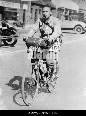 Mr Simon cycling round the world . 8 October 1934 . Stock Photo